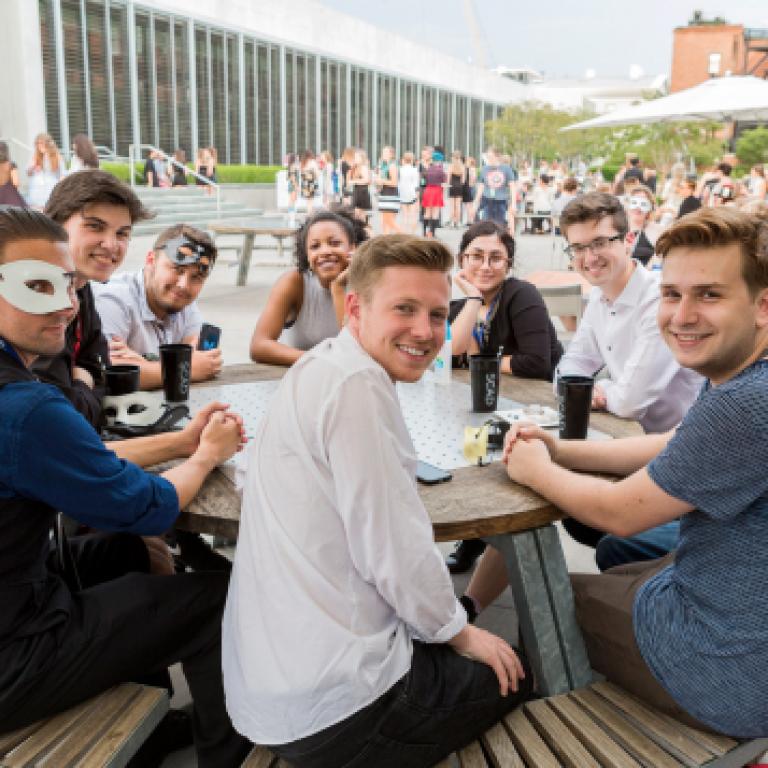 Teens sitting in MoA courtyard