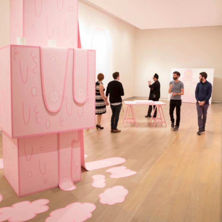 Museum visitors touring gallery
