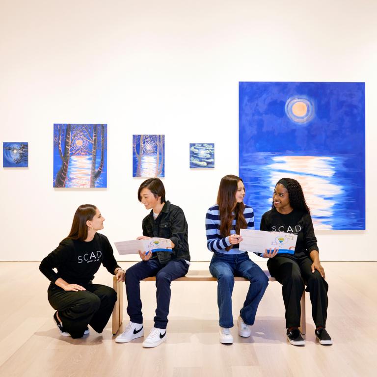 Museum visitors with docents