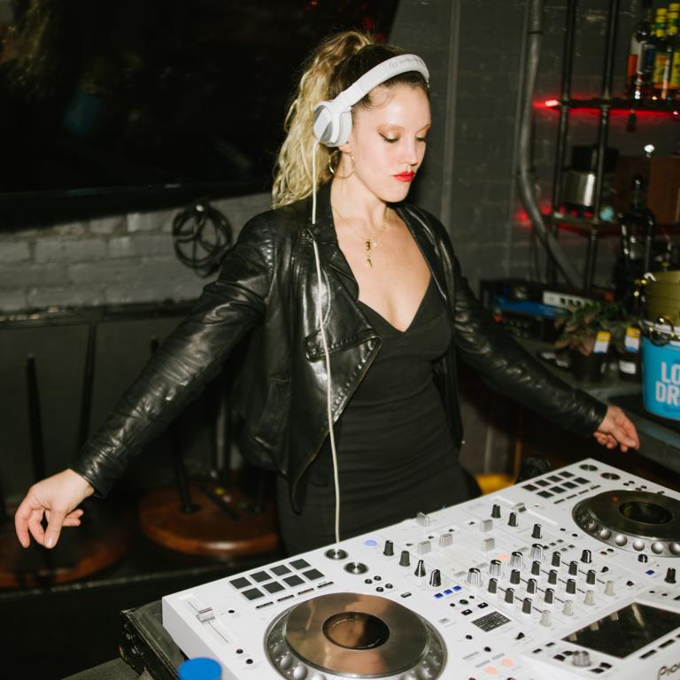DJ Miss Paradise at the turntables