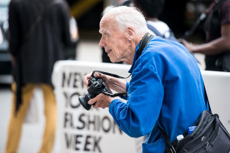 Photograph of Bill Cunningham at New York Fashion Week by Noam Galai, July 15, 2015. Image courtesy of Getty Images Entertainment.