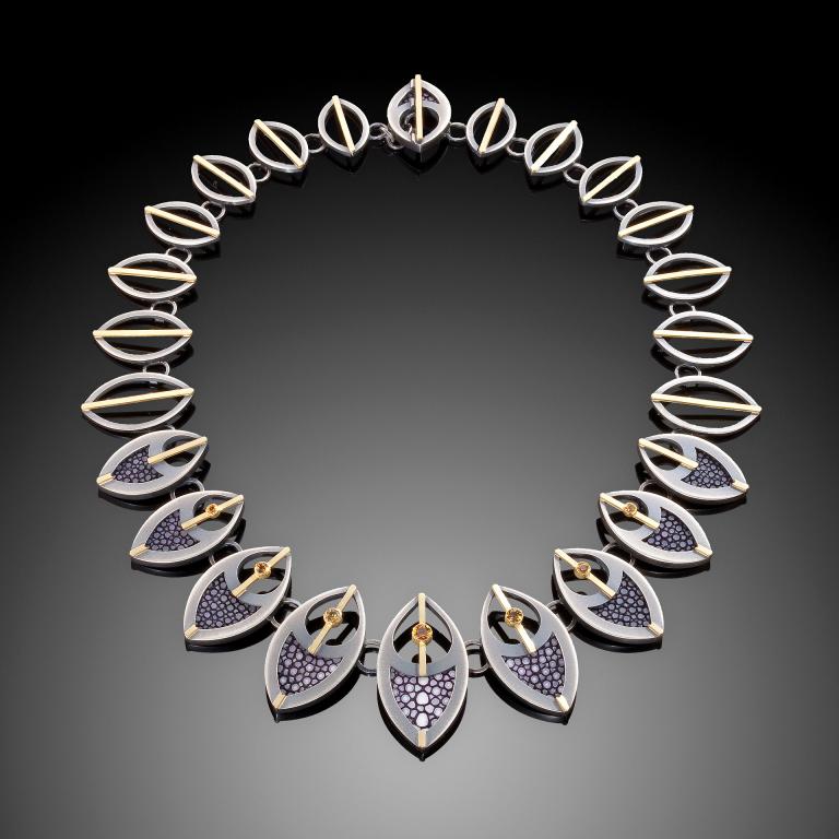 Megan Clark, "Stingray Feather Necklace," hand fabricated using sterling, 18-karat yellow gold, yellow sapphires, stingray leather and patina. Image courtesy of the artist and Jason Dowdle.