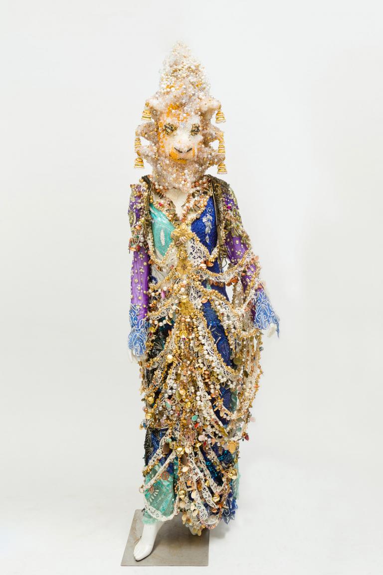 Raúl de Nieves, "Celebratory Skin/Perseverance," fiberglass, sequins, thread, glue, bells, plastic and glass beads, cardboard, and costume jewelry lace, 70" x 17.5", 2019. Courtesy of the artist and Company Gallery, New York. Signature image for Raul de Nieves exhibition