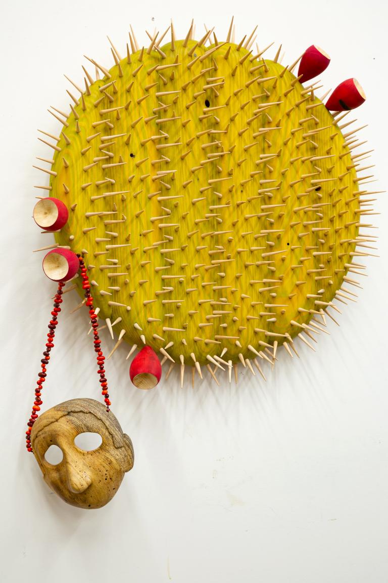 Raul De Lara, "19 Years So Far/19 Años Después," 2023, zompantle, Tz’ite beans, string, cedar, oak, Douglas fir, hemu, pigment, urethane, and lacquer, 38 x 6 1/2 x 29 in. Courtesy of the artist. signature image for Raul De Lara exhibition